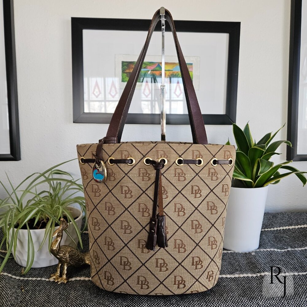 Dooney & Bourke Small Tassel Bucket Bag – Tan DB Monogram – Made in USA